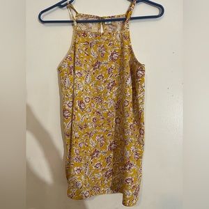 Spaghetti strapped floral tank top from, “Old Navy.”